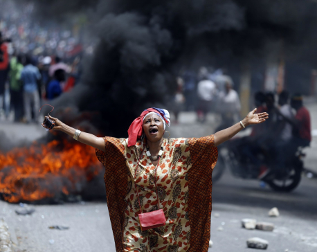2 deaths as protesters burn tires, block roads in Haiti