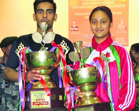 Dhami claims titles under three badminton categories