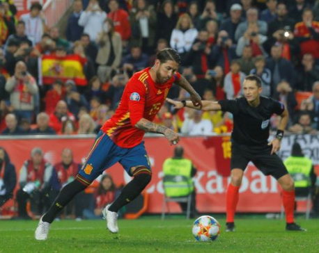 Nerveless Ramos gives Spain winning start
