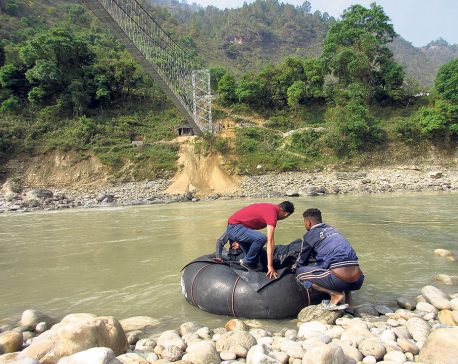 Locals still crossing Mahakali River using tubes as Indian officials defer inaugural of suspension bridge