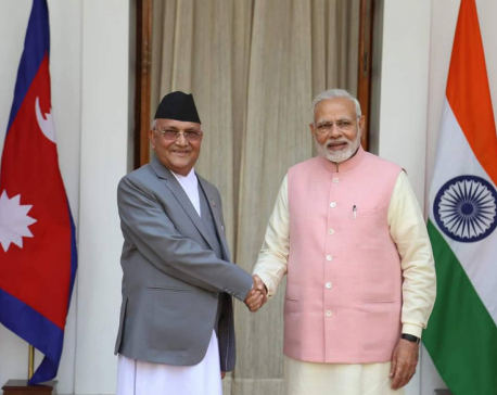 Prime Minister Oli returns home from India