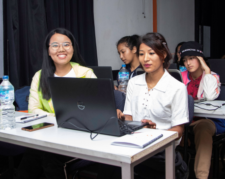 Red Circle Empowering Women as an Girls in ICT Day Initiative