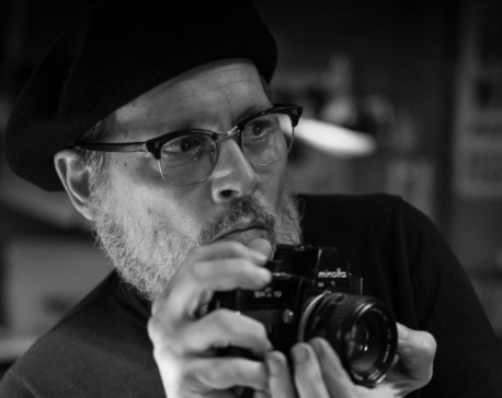 First Look at Johnny Depp as War Photographer W. Eugene Smith in ‘Minamata’