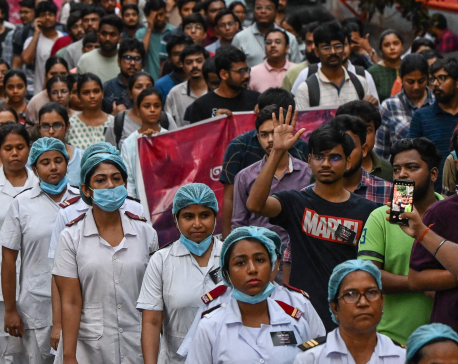 Indian doctors step up protests after colleague's brutal murder