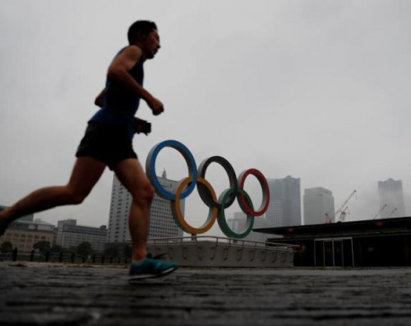 Tokyo goes to the polls as pandemic-shadowed Olympics loom