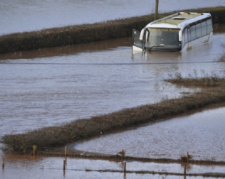 UK issues severe flood warnings; storm injures 9 in Germany