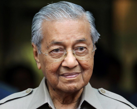 Malaysian rivals Mahathir and Anwar ally again in bid to end crisis