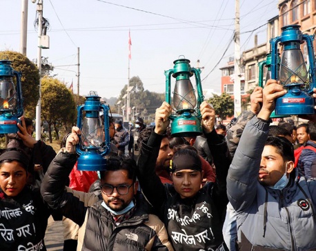 IN PICS: ANNFSU close to Dahal-Nepal faction of NCP stages lantern protest demanding reinstatement of lower house