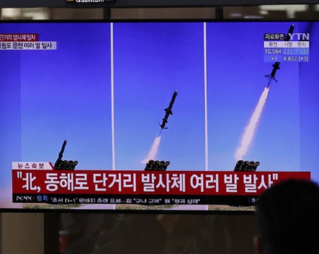 North Korea fires barrage of missiles from ground and air