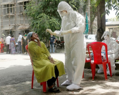 India's daily coronavirus cases at about 20,000 as some cities extend lockdowns