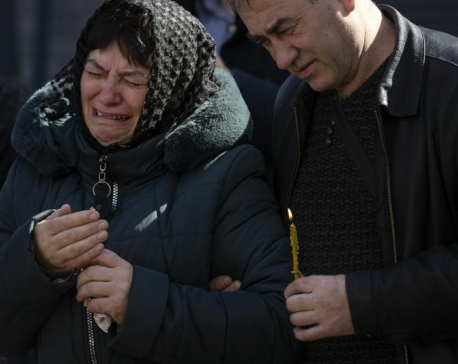 Police: More than 900 civilian bodies found in Kyiv region