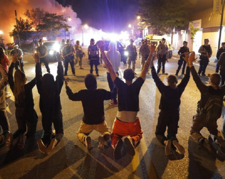 Thousands ignore Minneapolis curfew as U.S. protests spread
