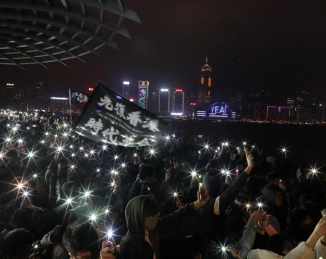 Thousands march in Hong Kong on New Year's Day, pledge to "keep fighting"