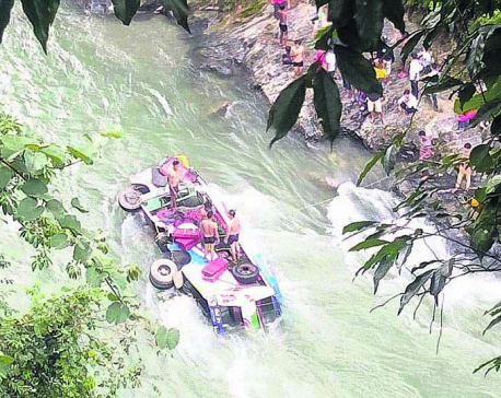 Bus plunges into river, two killed