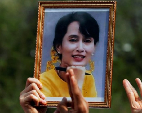 Myanmar court files another charge against Suu Kyi; protesters march again