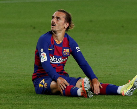 Barca's Griezmann injured, likely to miss title run-in