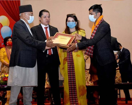 Nagarik journalist Adhikari felicitated