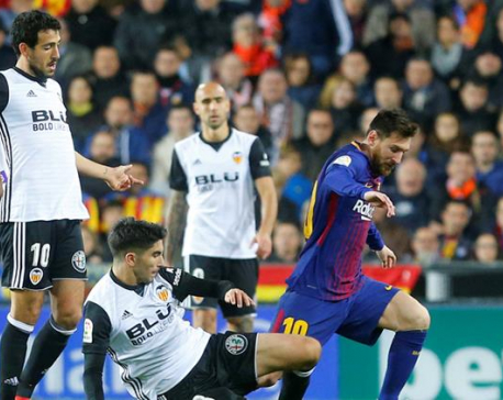 Barca draw at title rivals Valencia after goal-line controversy