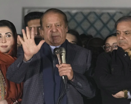 Pakistan’s ex-PM Sharif says he will seek a coalition government after trailing jailed rival Khan
