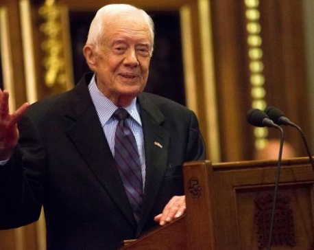Former U.S. President Carter hospitalized with broken pelvis after fall
