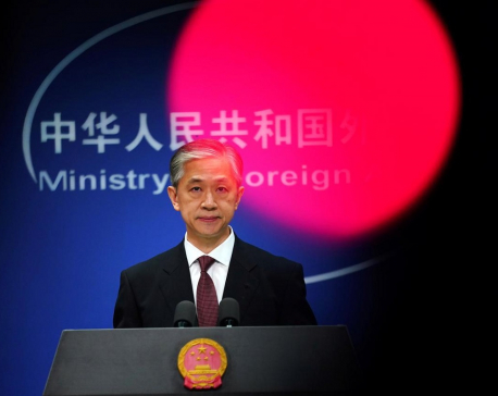 China vows retaliation if any U.S. action against journalists