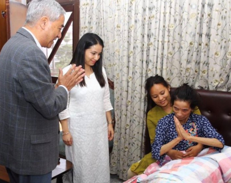 PM Deuba at Dahal's residence, inquires health condition of Dahal's spouse