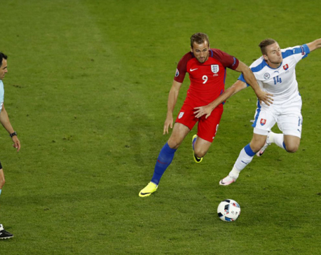 England reaches round of 16 after 0-0 draw with Slovakia