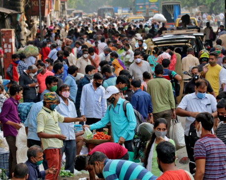 Indian coronavirus cases surge to new record as health system staggers