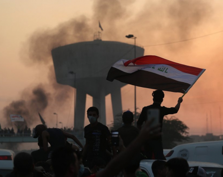 Curfew, more tear gas in Baghdad after 2 days of violence