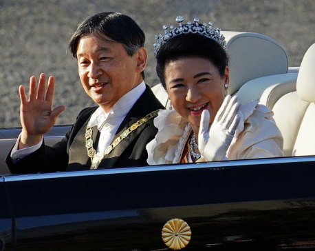 Japan emperor greets public in parade marking enthronement