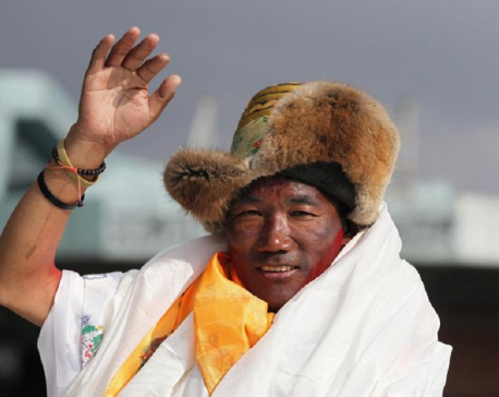 Sherpa guide scales Mount Everest for record 25th time