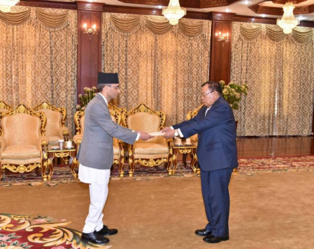 Ambassador Dhakal presents credentials to President of Laos