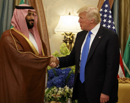 Saudis welcome Trump with gold medal, receive arms package