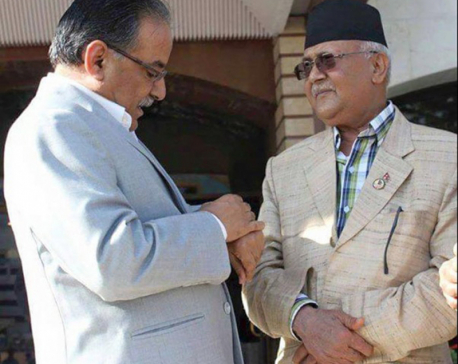 Maoists won't join govt until unification deal: Dahal to Oli