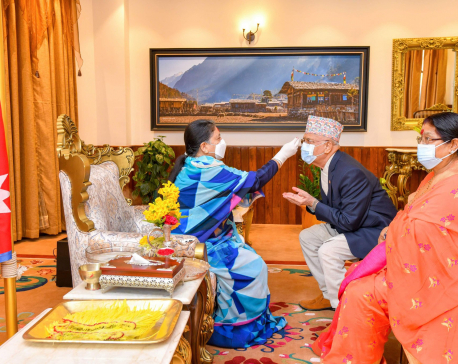 President Bhandari offers tika to Prime Minister Oli, first lady Shakya