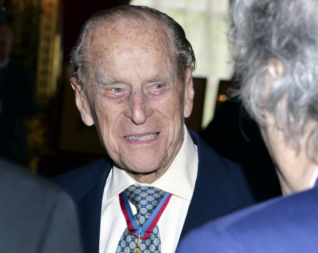 Prince Philip, 95, keeps calm but won't carry on royal duty