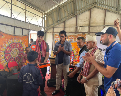 Rajesh Hamal distributes tablets to students of Jyamire