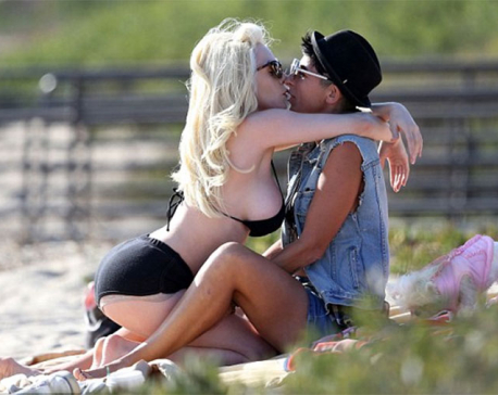 Fun in the sun: Courtney Stodden caught in throes of passion