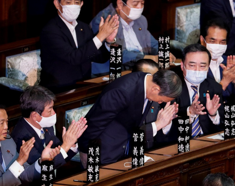 Japan's Suga formally voted in as PM, readies 'continuity cabinet'