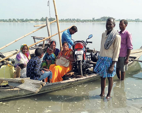 Locals of Susta using boats to cross Narayani River since ages due to lack of bridge