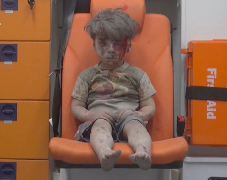 Haunting image of Syrian boy rescued from Aleppo draws outrage