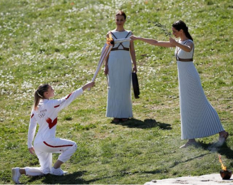 Tokyo 2020 torch lit behind closed doors in ancient Olympia