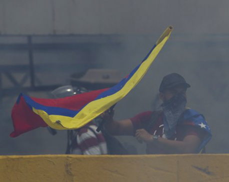Venezuela's Maduro hikes minimum wage amid rising protests