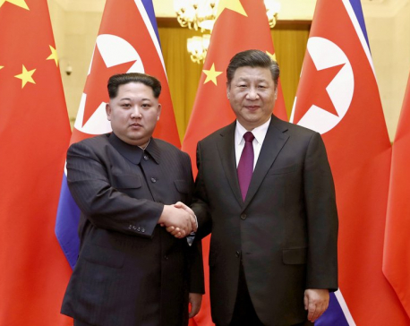 Kim, Xi portray strong ties after NKorea leader’s China trip