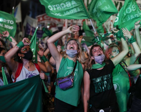 Argentina’s abortion law enters force under watchful eyes