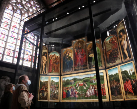 Belgium unveils new showcase for ill-treated Ghent masterpiece