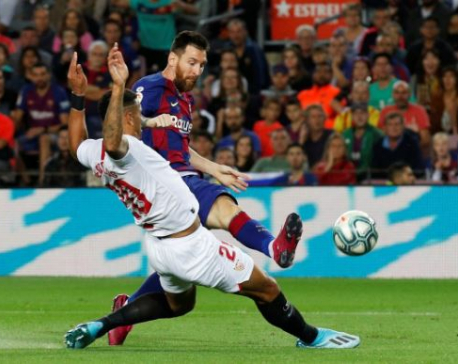 Ruthless Barca thrash Sevilla but have two players sent off