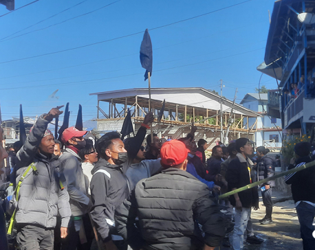 Identity supporters display black flags at Yogesh Bhattarai’s residence in Taplejung
