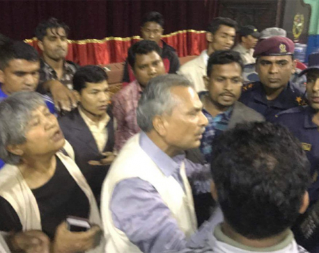 Police manhandle Dr. Bhattarai
