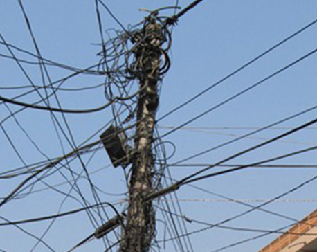Haphazardly placed cables being managed in Biratnagar